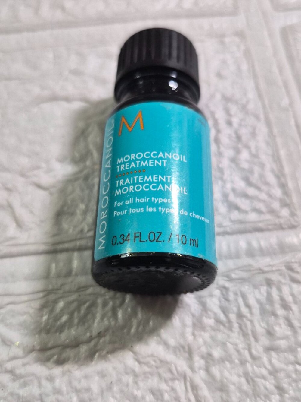 0.34 fl. oz. sample bottle of Moroccanoil Treatment Quality Brand All hair types